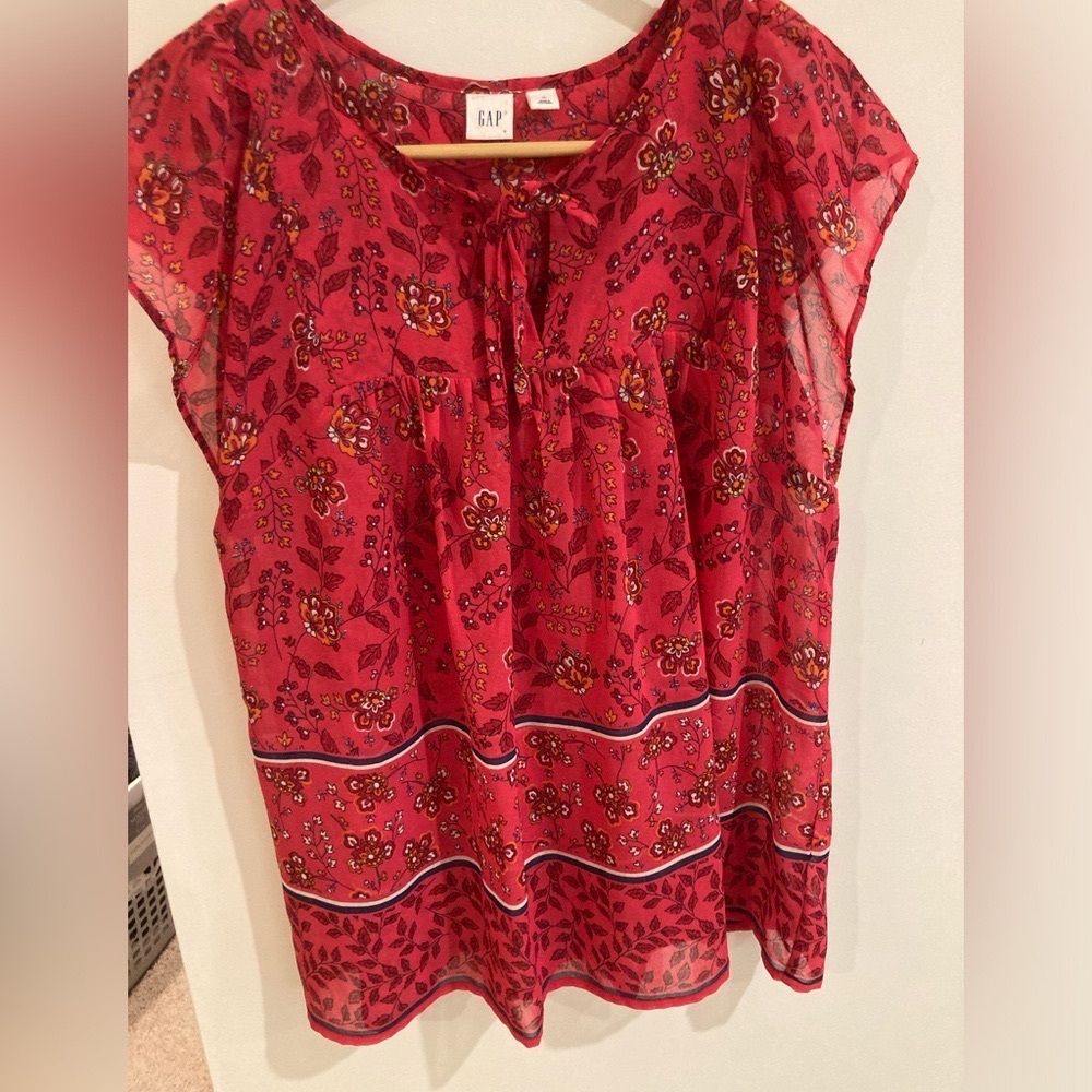 Red slinky blouse.  Lovely print.